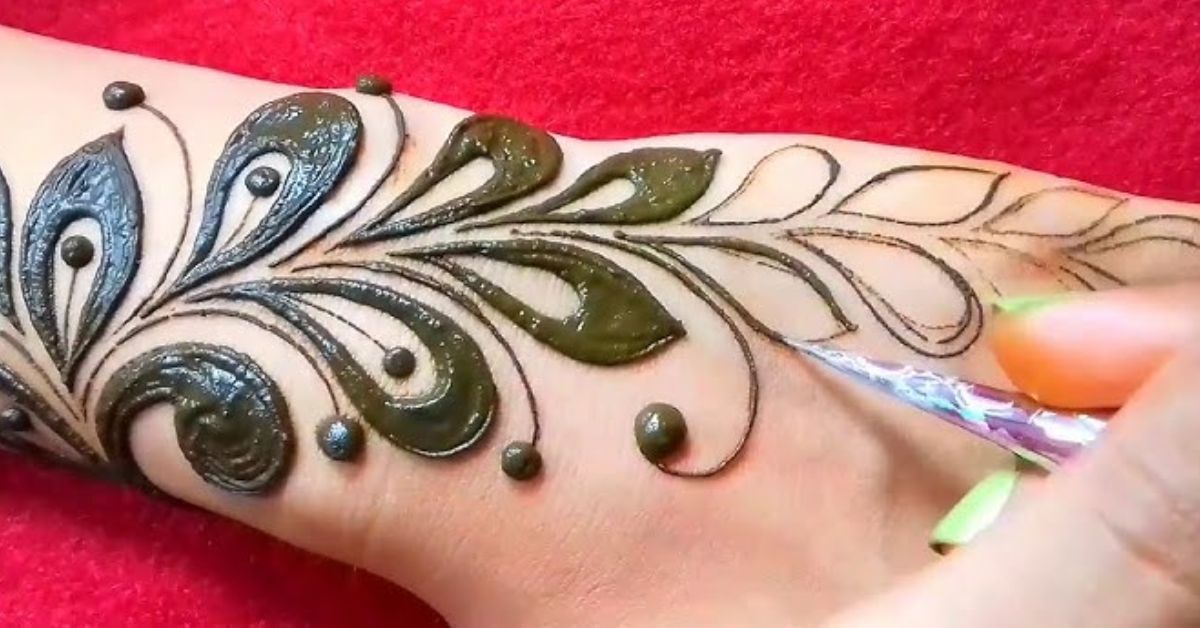 Best stylish one side mehndi design for back hand