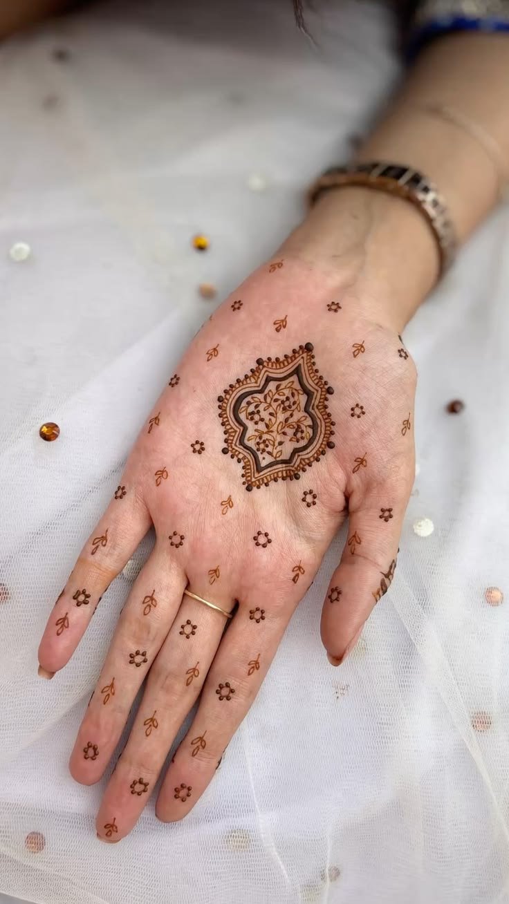 simple mehndi design flower front hand