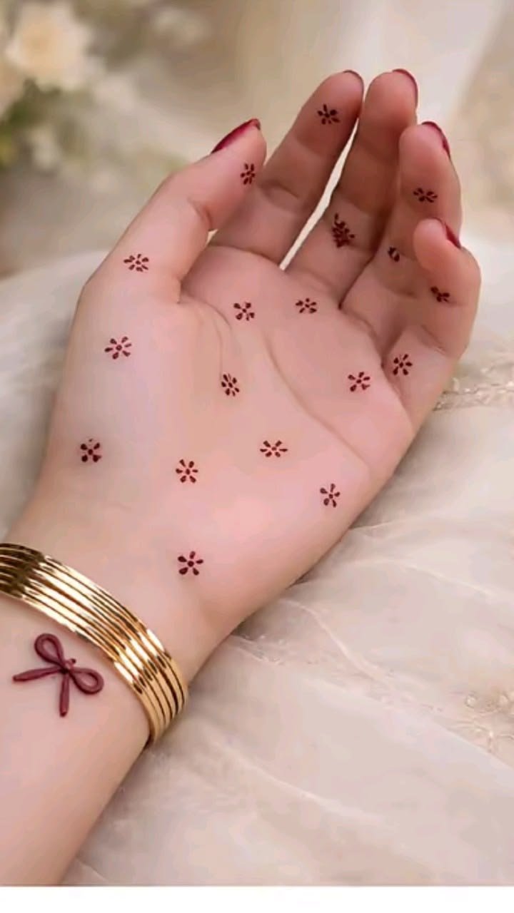 small flower mehndi design for front hand